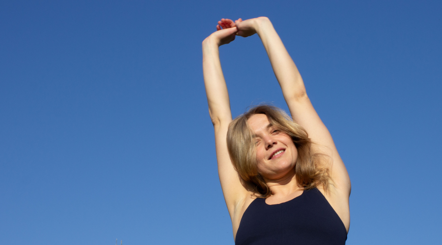 marie with hands in the sky
